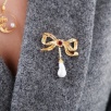 Handmade Design Silver Brooch Baroque Pearl with Ribbon Design